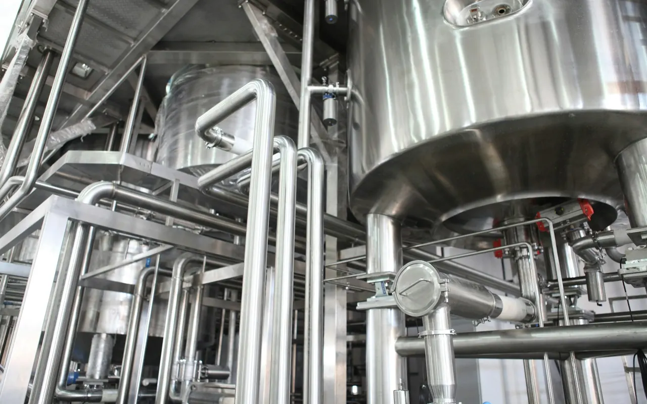 Stainless steel process tanks and pipework in a production plant
